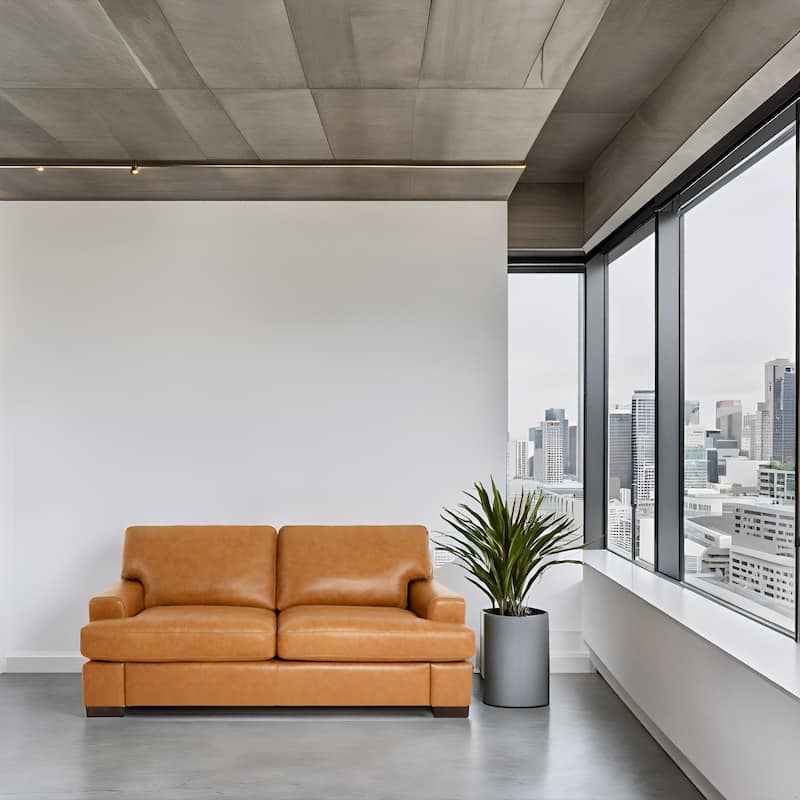 Premium Genuine Leather Loveseat with Deep Plush Seating and Goose Feather Cushions for Ultimate Comfort