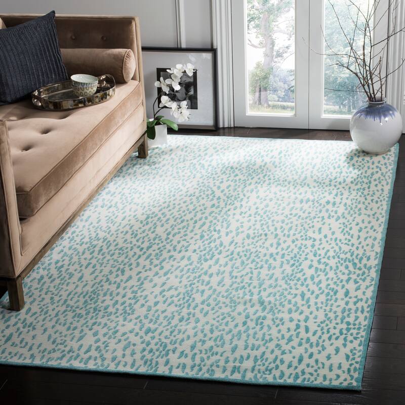 SAFAVIEH Handmade Marbella Goril Modern Polyester Rug - 5' x 8' - Ivory/Turquoise