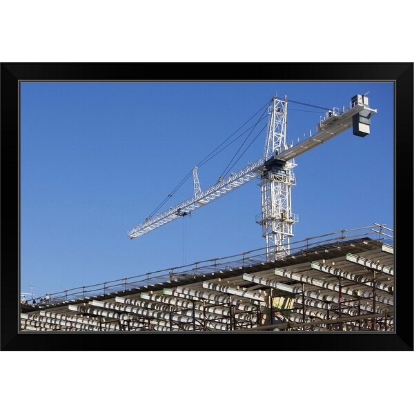 "USA, New York, Long Island, New York City, Crane on construction site" Black Framed Print