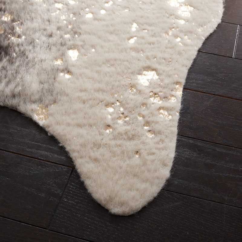 SAFAVIEH Faux Cow Hide Rassima Animal Rug