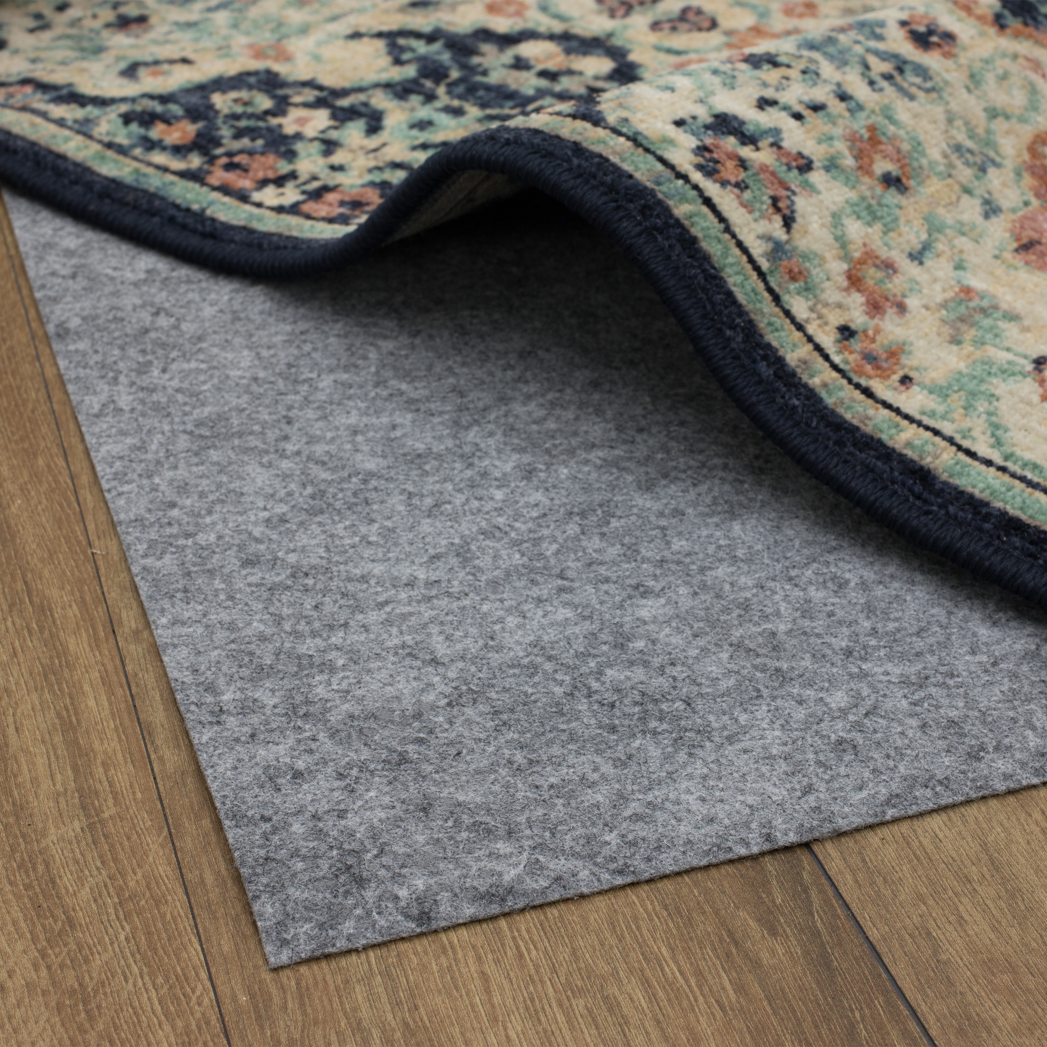 https://ak1.ostkcdn.com/images/products/is/images/direct/050120080b377964f915a045a930ee6ed9245146/Mohawk-Home-Pet-Friendly-Dual-Surface-Rug-Pad.jpg