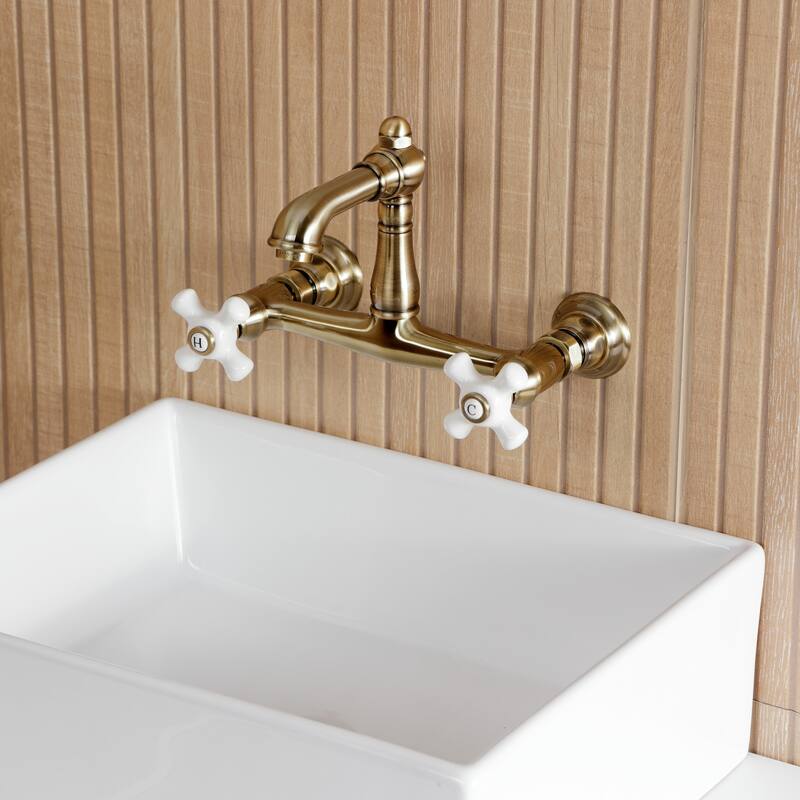 Kingston Brass English Country Two-Handle 2-Hole Wall Mount Bathroom Faucet