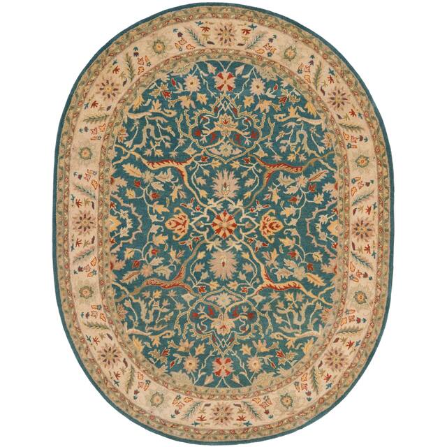 SAFAVIEH Handmade Antiquity Izora Traditional Oriental Wool Rug - 7'6" x 9'6" Oval - Blue