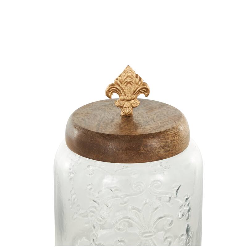Clear Glass Scroll Living Room Decorative Jars with Brown Wooden Lids and Gold Fleur-De- Lis Knobs (Set of 2)