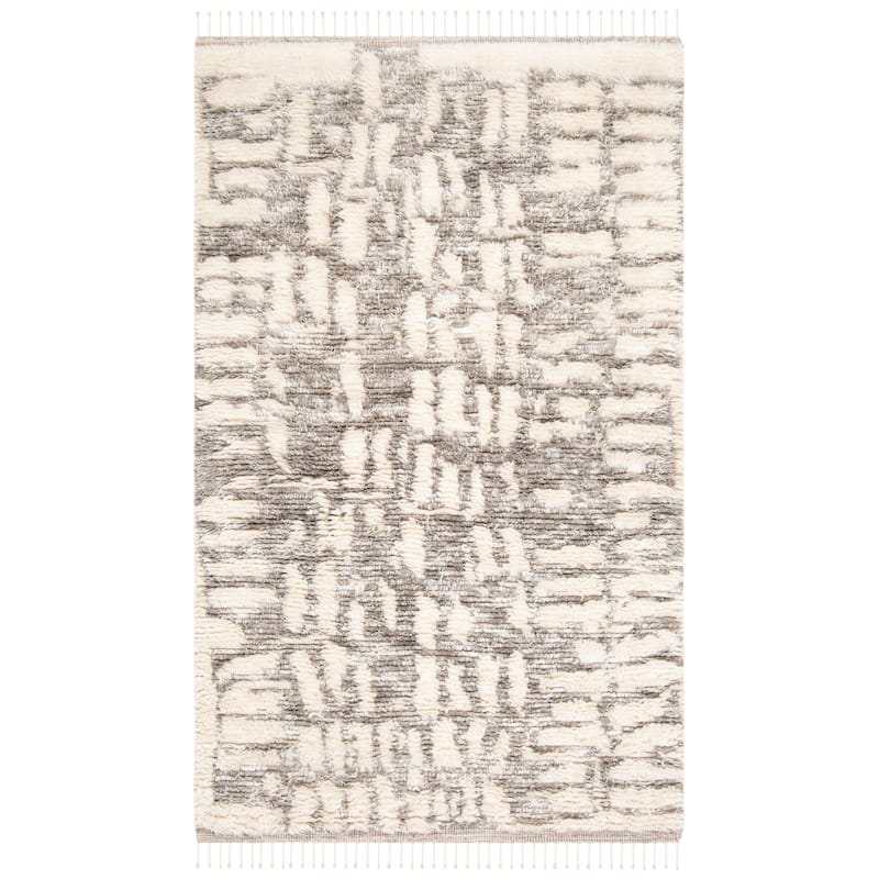 SAFAVIEH Hand-Knotted Manhattan Florije Wool Tassel Rug