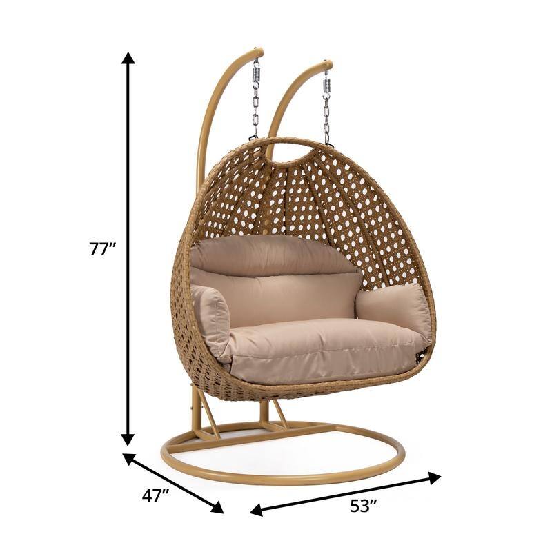 LeisureMod Mendoza 2-Person Hanging Egg Swing Chair - Handcrafted Light Brown Wicker, Patio Hammock Lounger with Cushions - 53"