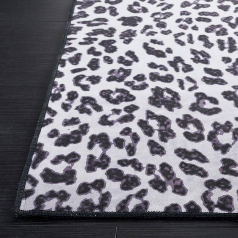 SAFAVIEH Faux Hide Machine Washable Slip Resistant Emmaliese Rustic Leopard Print Rug On Sale