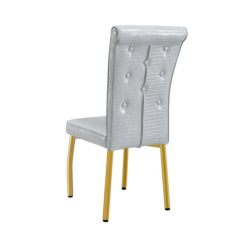 A set of 2 vintage crocodile leather cushioned dining chairs, featuring crystal clasp design and artificial leather design