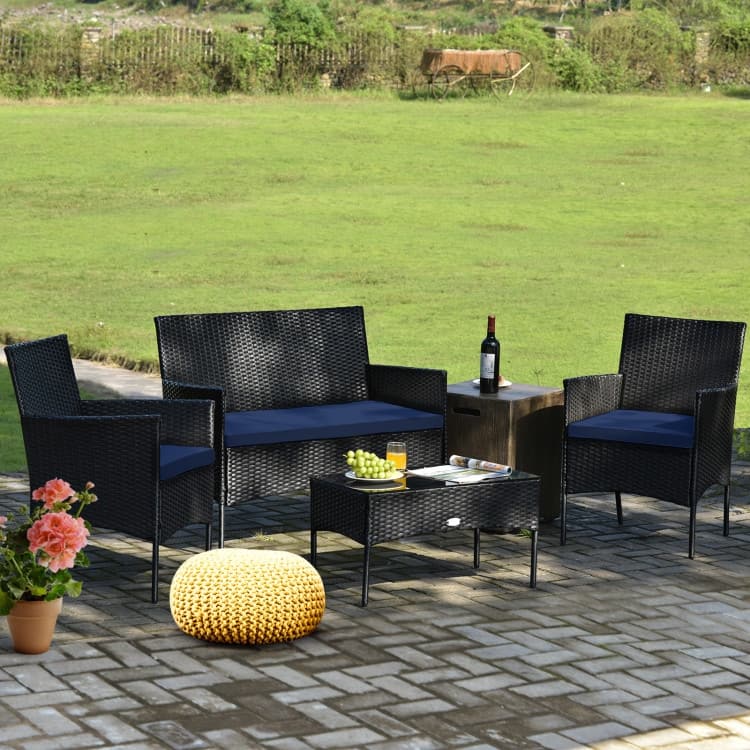 4 Pieces Patio Rattan Cushioned Sofa Set with Tempered Glass Coffee Table - 24" x 23.5" x 33" (L x W x H)