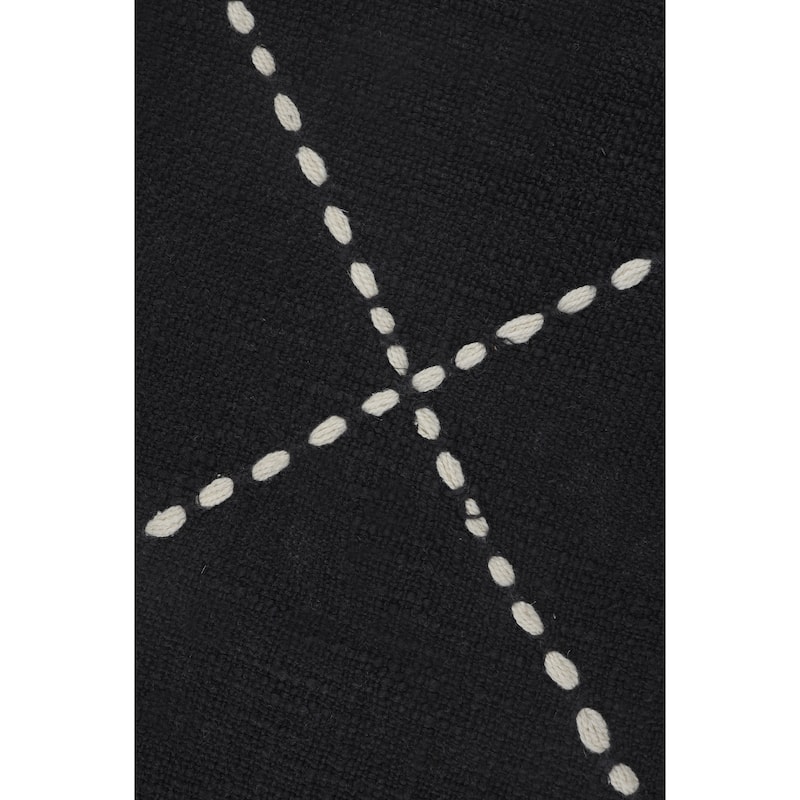 Sevita Black and White Geometric Tasseled Throw Pillow