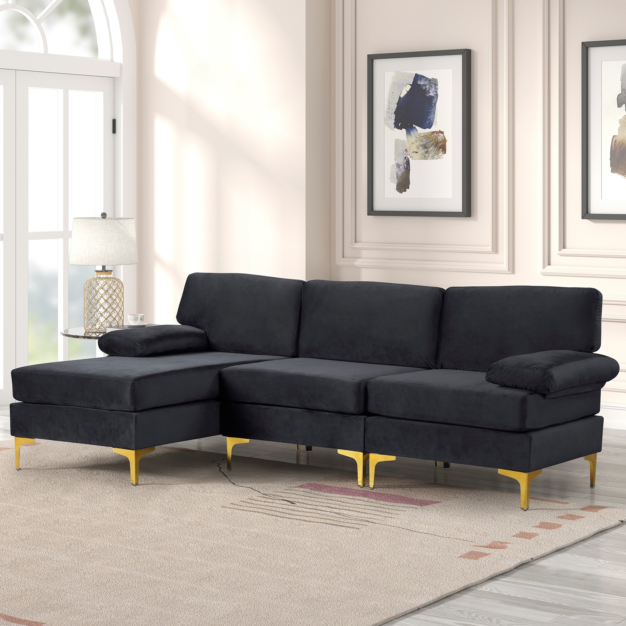 Black velvet sectional with gold deals legs