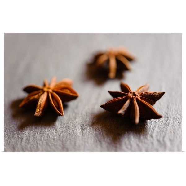 "Dried Star anise pods displayed on a slate tray." Poster Print