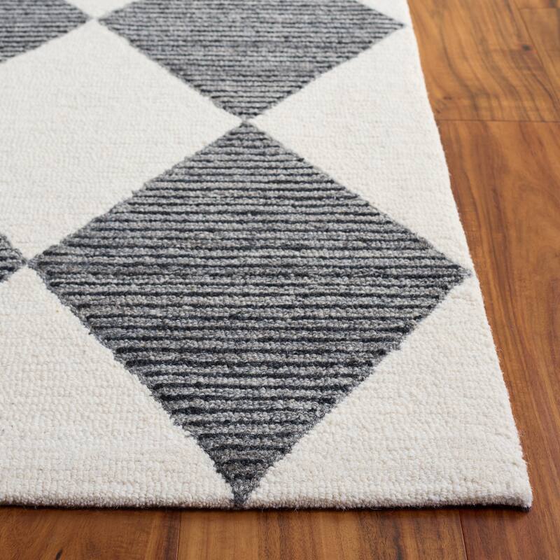 SAFAVIEH Handmade Ebony Krsta Contemporary Wool Rug