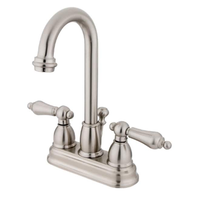 Kingston Brass Restoration Centerset Bathroom Faucet with Pop-Up Drain