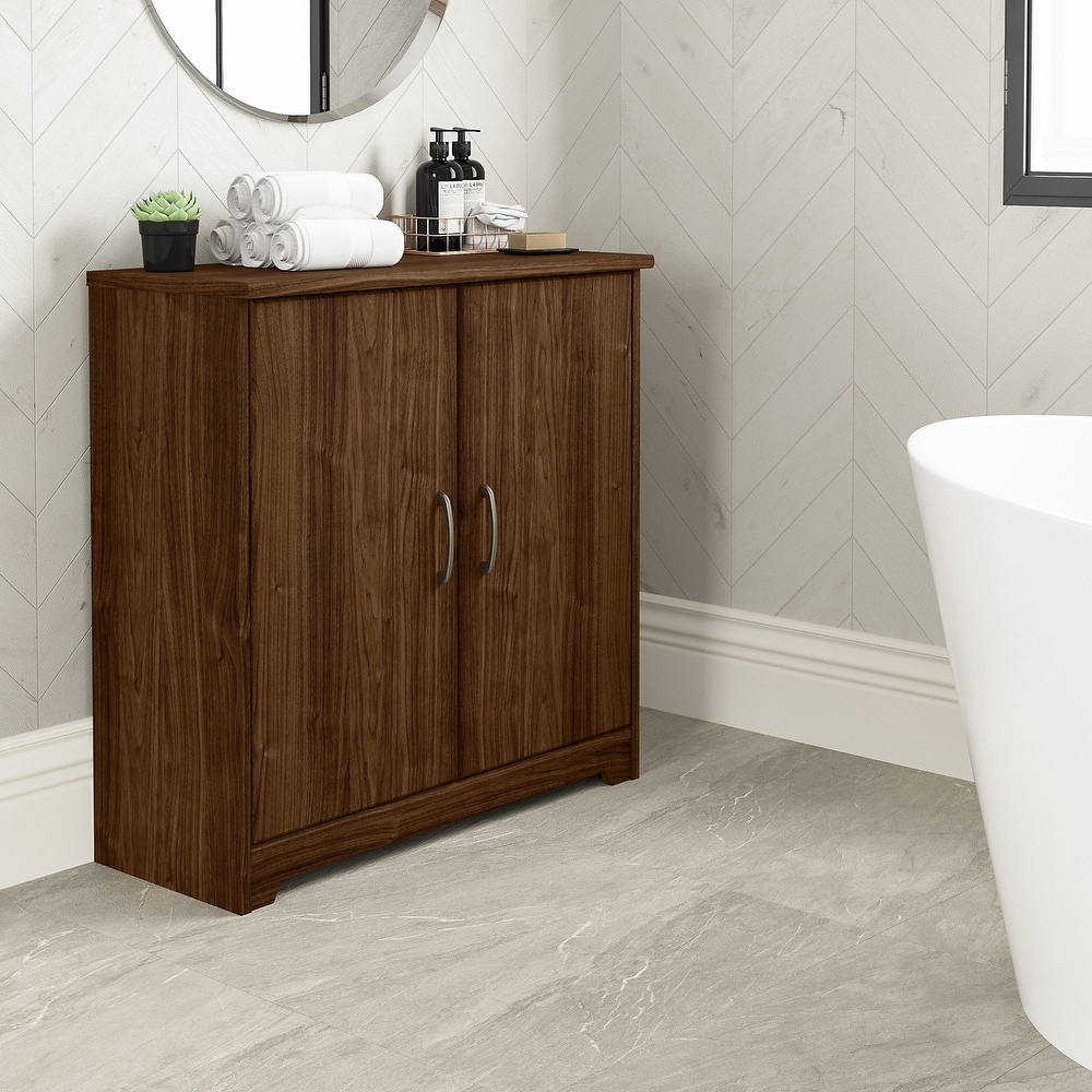 https://ak1.ostkcdn.com/images/products/is/images/direct/06a9ca4edd0df8d8f3f2c6363c559328caa5c0fc/Cabot-Small-Bathroom-Storage-Cabinet-with-Doors-by-Bush-Furniture.jpg