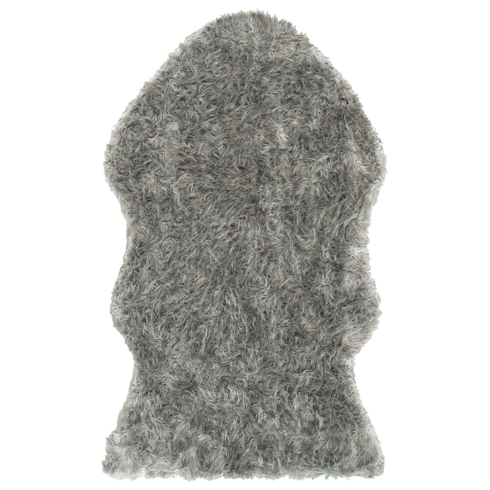 SAFAVIEH Faux Sheep Radena Christen Shag Solid Rug