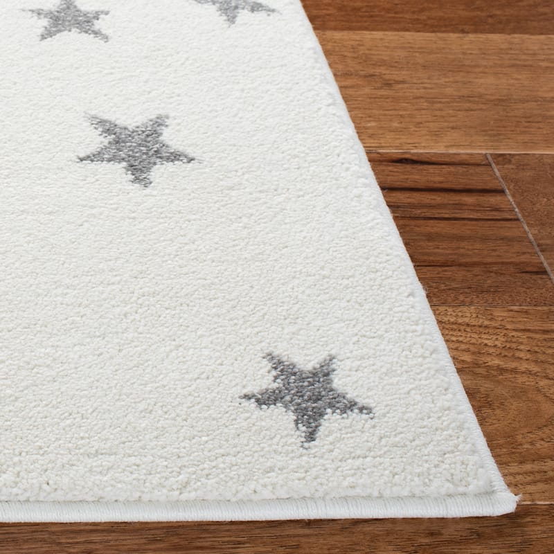 SAFAVIEH Carousel Kids Aine Moon Rug