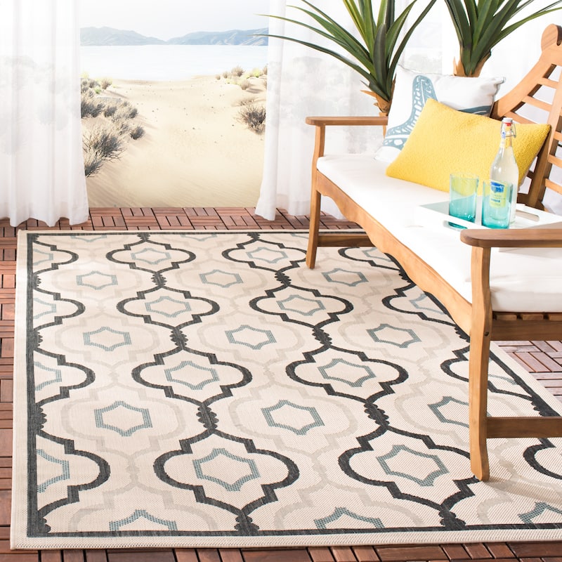 SAFAVIEH Courtyard Oyvor Indoor/ Outdoor Waterproof Patio Backyard Rug - 5'3" x 7'7" - Ivory/Black