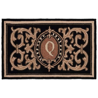 SAFAVIEH Handmade Monogram Gulcan Casual Rug