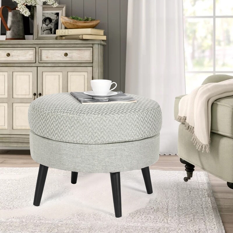 https://ak1.ostkcdn.com/images/products/is/images/direct/073ca37560461da466f7434793490ea5b8fc13b2/Adeco-Round-Footrest-Ottoman-Fabric-Footstool-Coffee-Table-Living-room.jpg