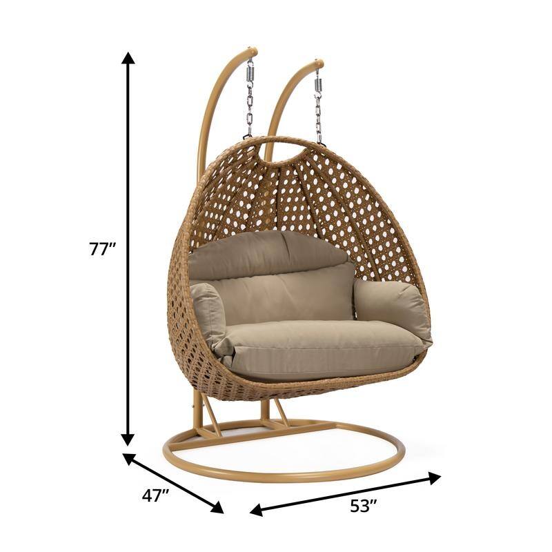 LeisureMod Mendoza 2-Person Hanging Egg Swing Chair - Handcrafted Light Brown Wicker, Patio Hammock Lounger with Cushions - 53"