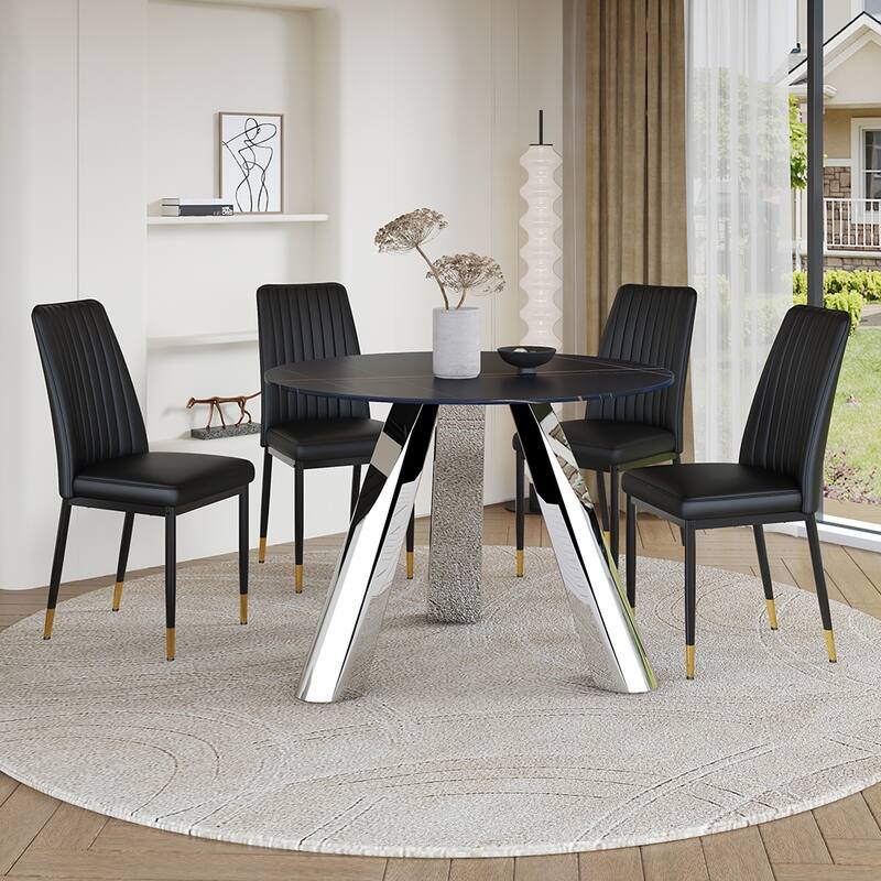 A 42-Inch Round Black Dining Table With A Granite Top And Stainless Steel Legs, Paired With Four Pu Material Dining Chairs