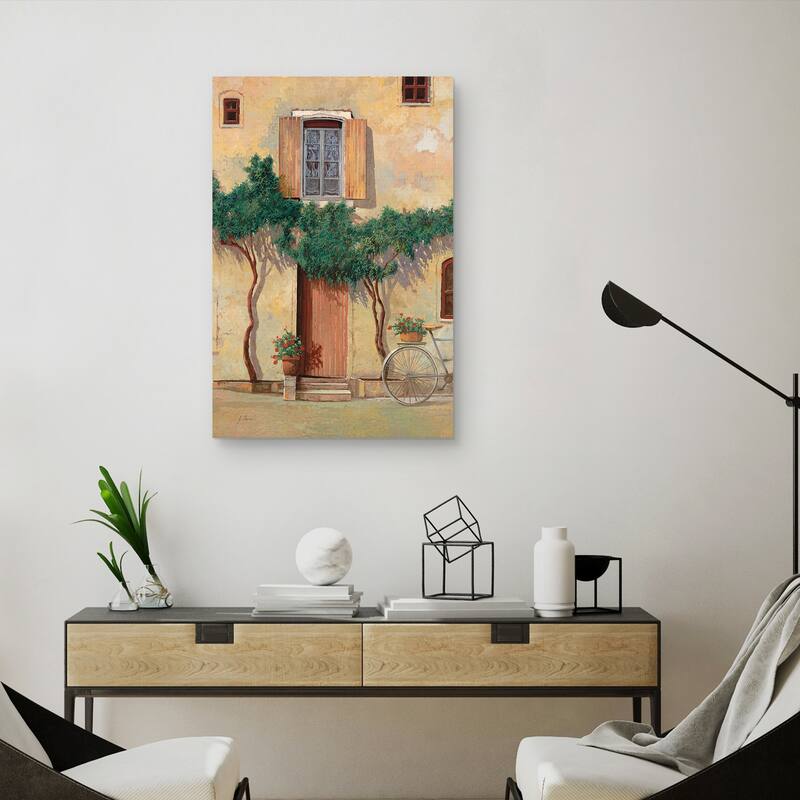 Mezza Bicicletta Sul Muro by Guido Borelli Canvas Art Print