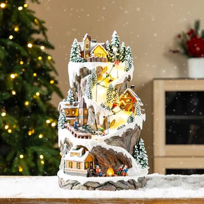 Glitzhome 15.50"H Lighted Christmas Skiing Moutain Resin Village with Movement and Music