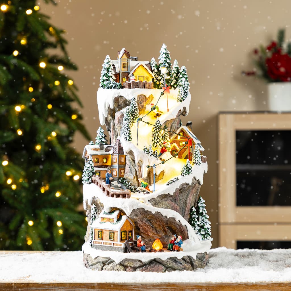 Glitzhome 15.50"H Lighted Christmas Skiing Moutain Resin Village with Movement and Music
