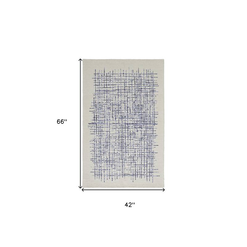 Sixu Hand Tufted Stain Resistant Area Rug By HomeRoots - 66' X '42' X '0.5