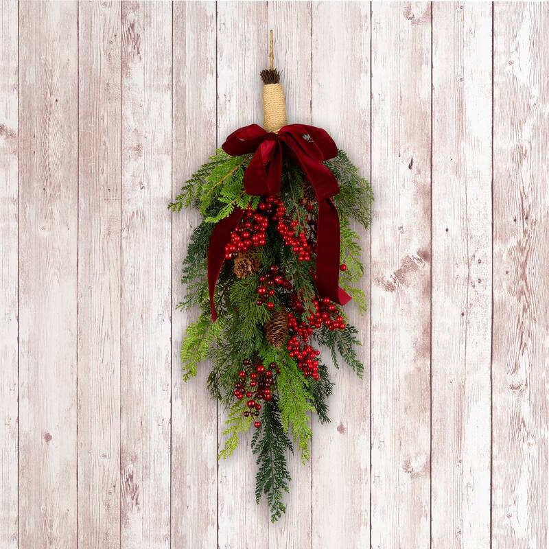 National Tree Company 28 in. Artificial Christmas Joy Teardrop Swag with Red Berries and Bow - 28 in
