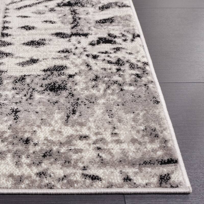 SAFAVIEH Skyler Otelia Modern Abstract Border Rug