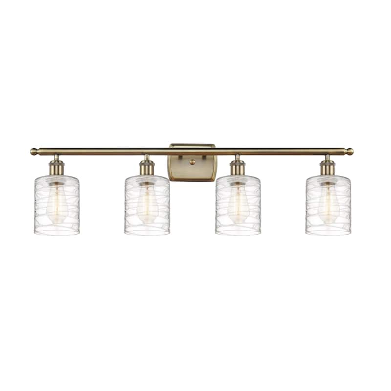 Innovations Lighting Ballston Cobbleskill - 4 Light 36" Bath Vanity Light - Deco Swirl/Antique Brass Finish