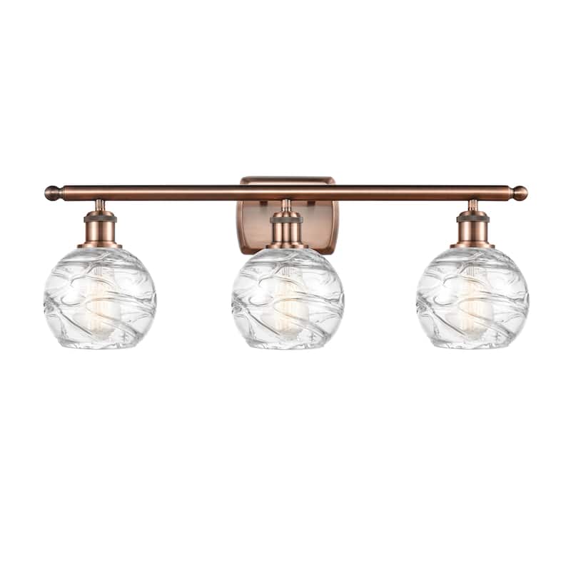 Innovations Lighting Small Deco Swirl 3 Light 26" Wide Bathroom Vanity - Antique Copper / Clear
