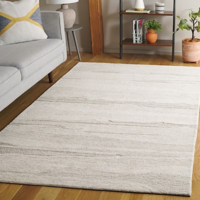 SAFAVIEH Hand-Tufted Ebony Zaiga Modern & Contemporary Wool Rug