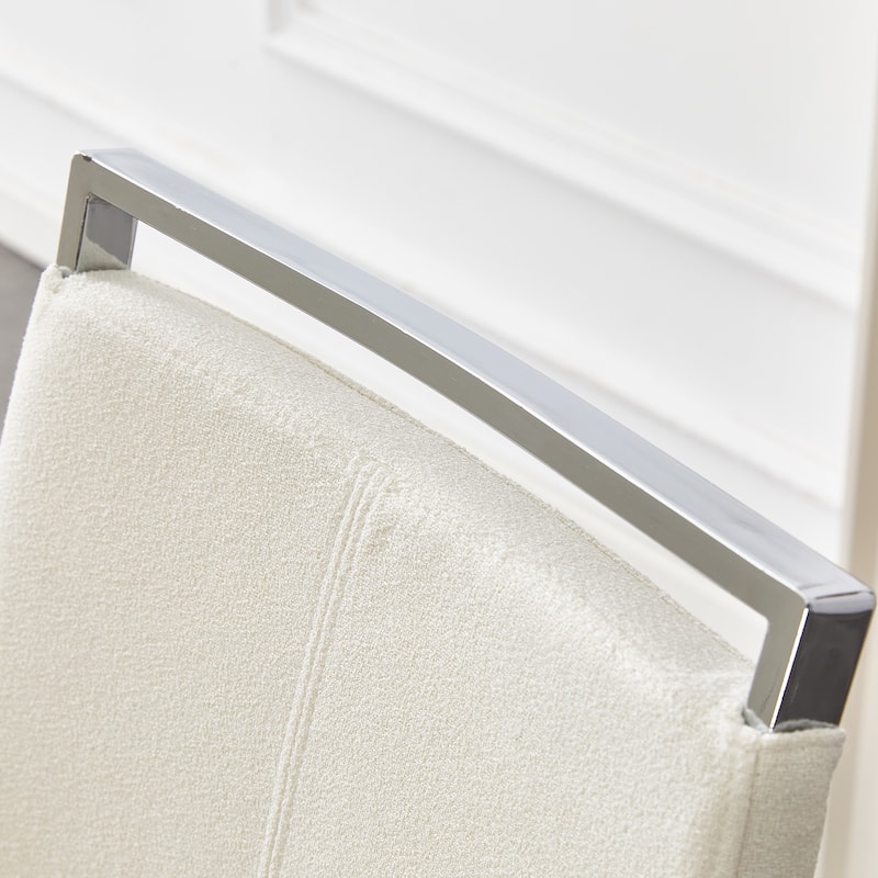 Luxury - style Dining Chairs.The combination of white grainy fabric-like fabric and silver metal legs is stylish.Set Of 2.