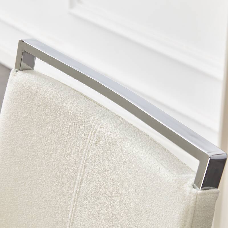 Set of 4 Dining Chairs. Comfort & Stability in One.The combination of grainy fabric-like fabric and silver metal legs