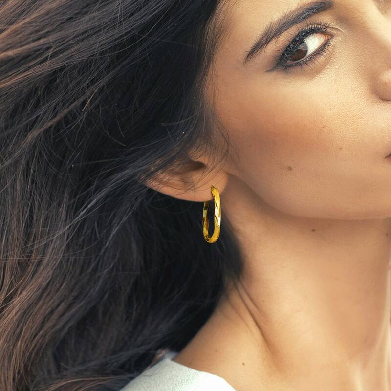 Miadora Yellow Plated Sterling Silver 33x23mm Twist Oval Hoop Earrings