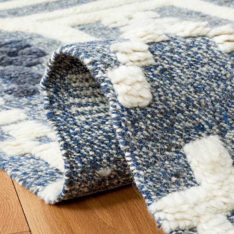 SAFAVIEH Hand-Knotted Casablanca Shag Liliya Wool Tassel Rug