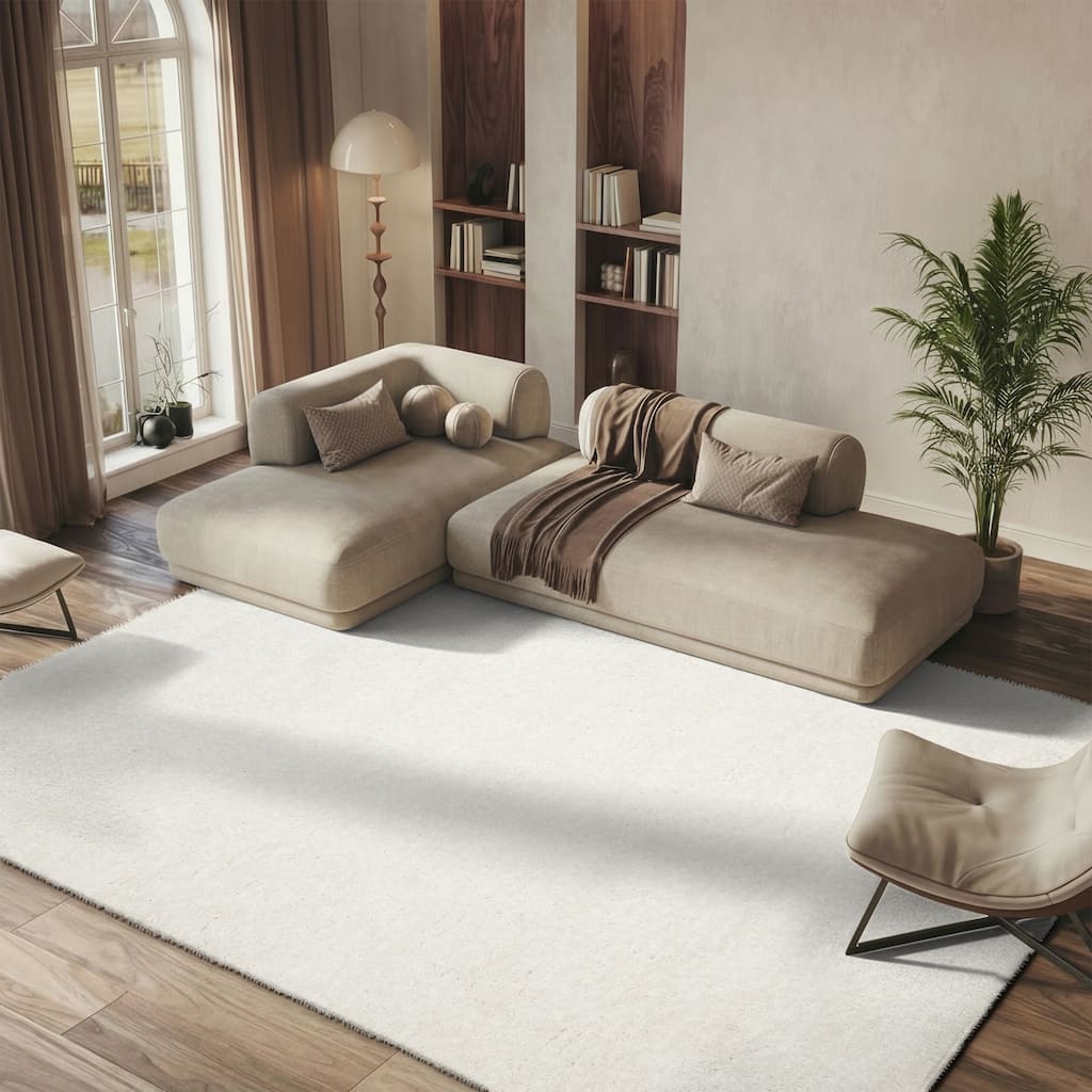 SAFAVIEH Handmade Latifah Shag Rositha Solid Polyester Rug