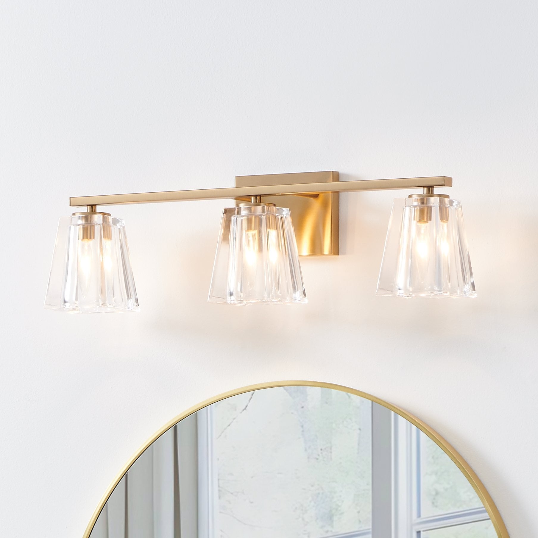 Thesis Valentin 24-inch 3-light Champagne Gold Vanity Light with Clear Pressed Glass Shades