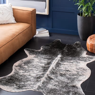 SAFAVIEH Faux Cow Hide Sinne Animal Rug