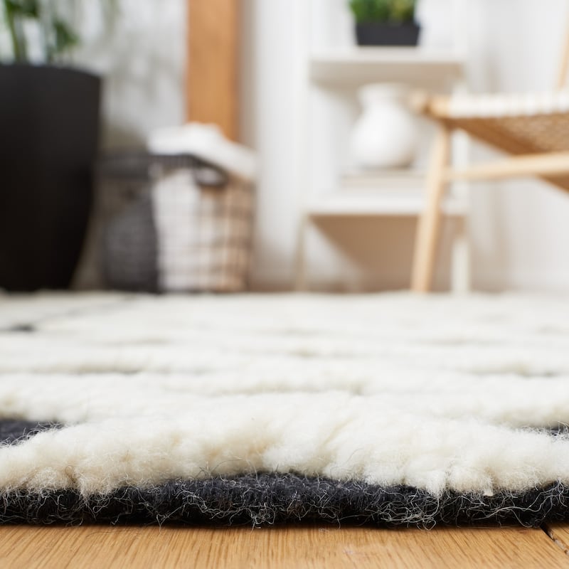 SAFAVIEH Hand-Knotted Casablanca Shag Fazila Wool Tassel Rug