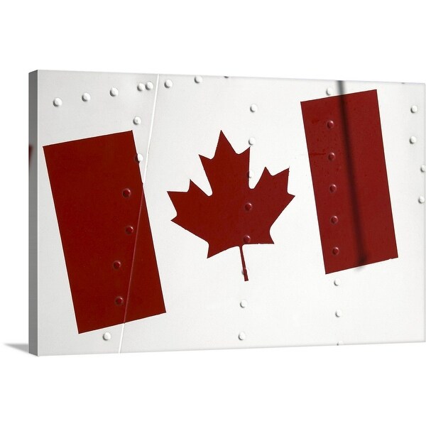 "Canadian flag painted on the exterior of an airplane" Canvas Wall Art
