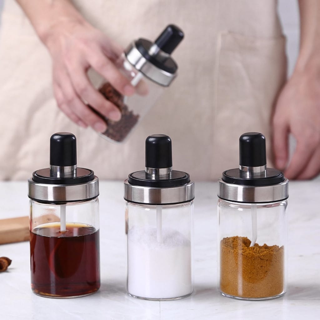 https://ak1.ostkcdn.com/images/products/is/images/direct/08c6bf658d03ad8b78a04ed26384d1fd3988c079/Kitchen-Supplies-Glass-Seasoning-Bottle-Salt-Storage-Box-Spice-Jar-With-Spoon.jpg