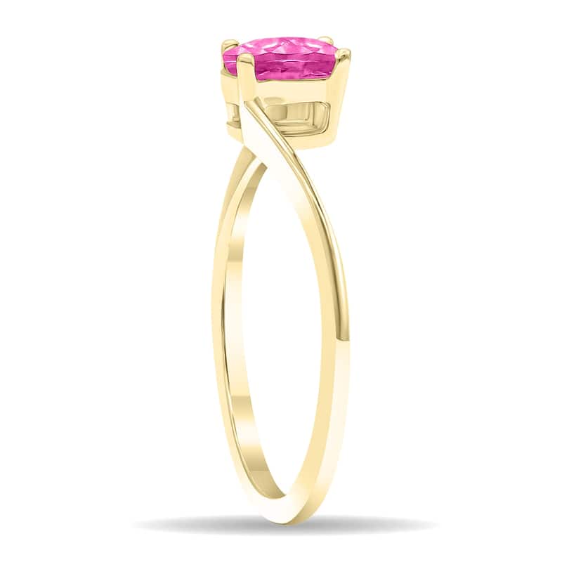 Women's Solitaire Oval Shaped Pink Topaz Wave Ring in 10K Yellow Gold