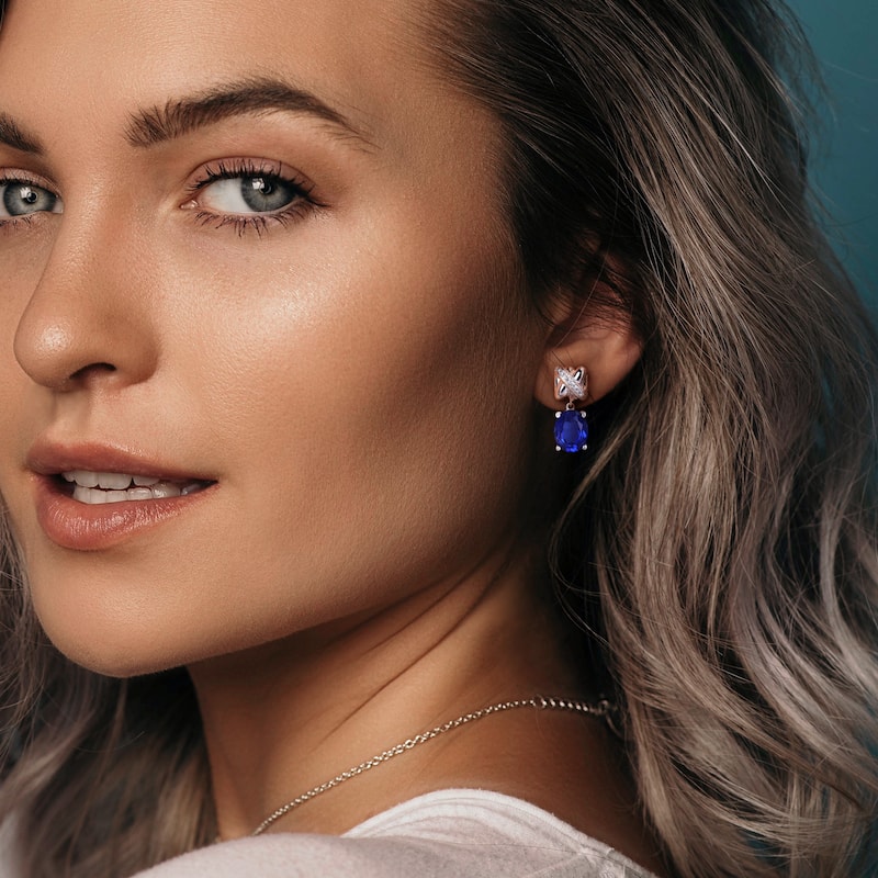 Miadora 8 1/3ct TGW Oval-Cut Created Blue Sapphire 1/10ct TDW Diamond Earrings 14k White Gold