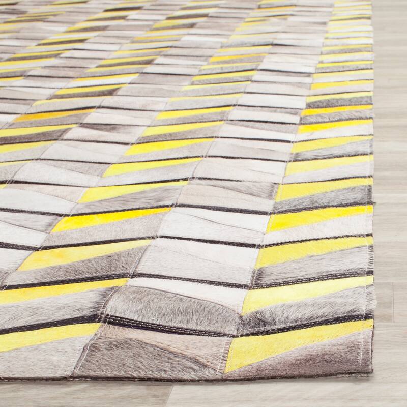 SAFAVIEH Handmade Studio Leather Rachela Modern Leather Rug