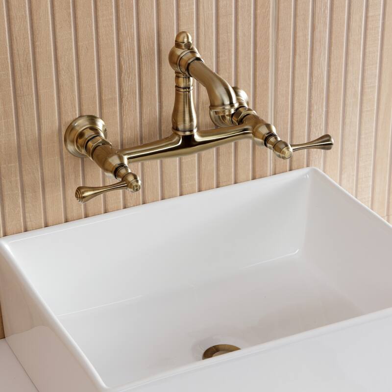 Kingston Brass English Country Two-Handle 2-Hole Wall Mount Bathroom Faucet