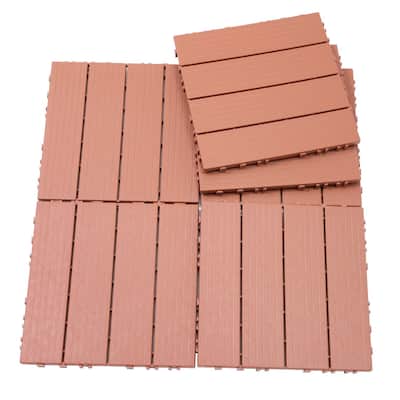 Four slat plastic outdoor flooring tiles